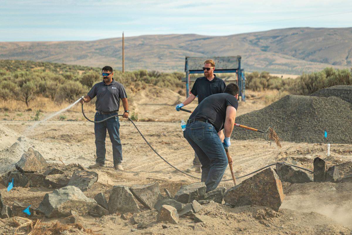 Volunteers with Hayden Homes work on trails and sensory gardens at the Ranch, a planned retreat being built by the Friends of Disabled Veterans.