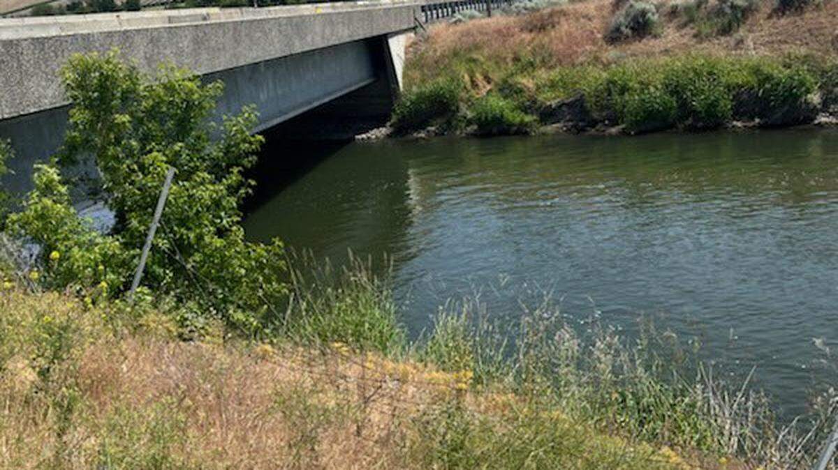 A car ended up underwater after the driver allegedly tried to flee from police after driving 90 mph through a construction zone.