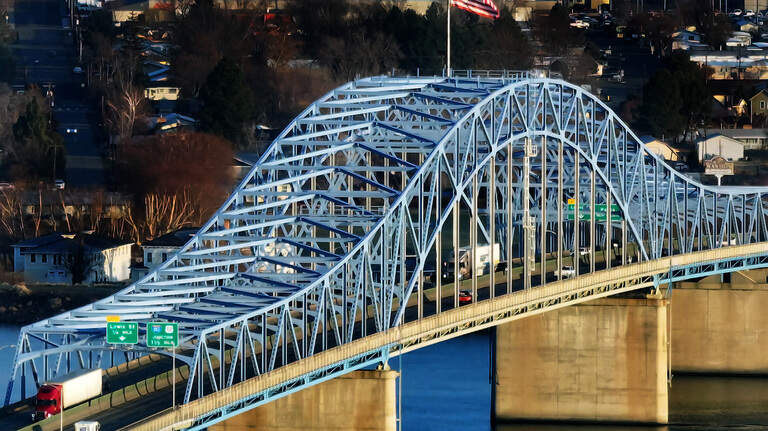 Is the blue bridge finally done? See our photos of the $33M traffic-jamming paint job