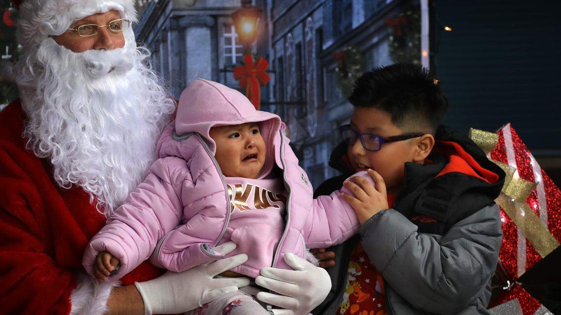 Offering reassurance during stressful Santa Claus visit in Kennewick