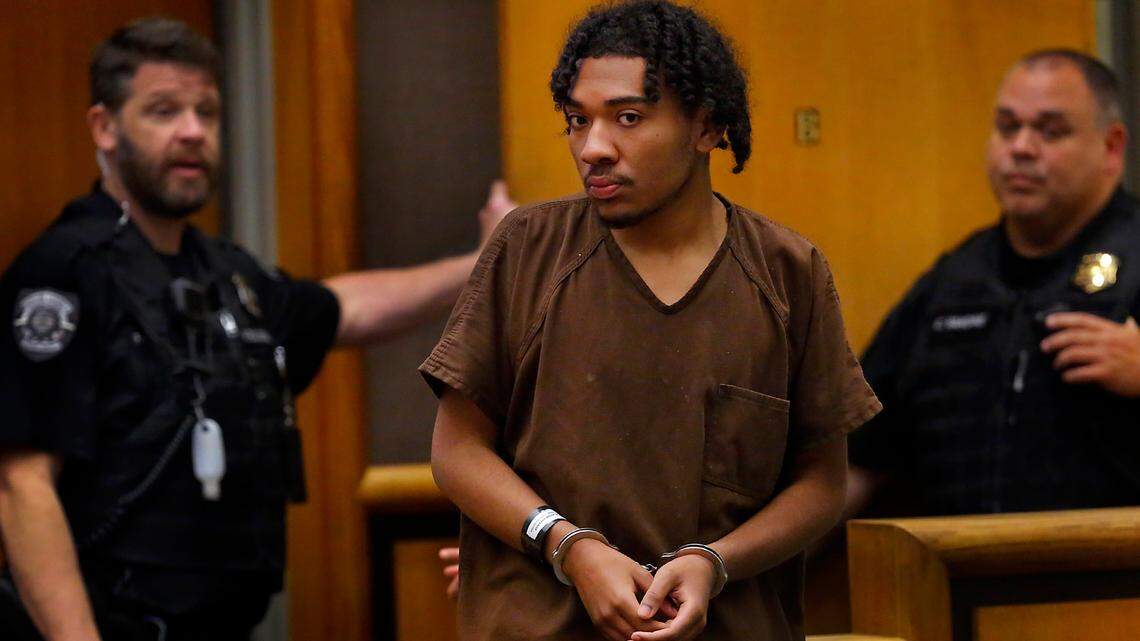 Jacob Young walks into Benton County Superior Court in 2022 for his arraignment on a first-degree murder charge.