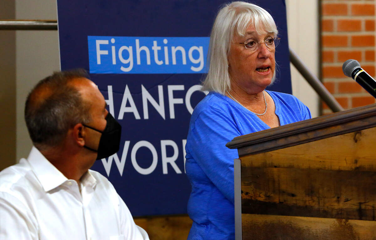 U.S. Sen. Patty Murray, D-Wash., discusses help for Hanford workers at risk of an incurable lung disease,as Steve Maki, a union worker trainer director at HAMMER, listens in August 2022 in Pasco.