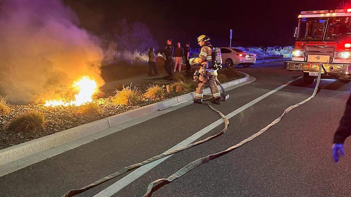 A motorcycle caught fire after a crash on Bob Olson Parkway Sunday night. The rider was taken to a hospital.