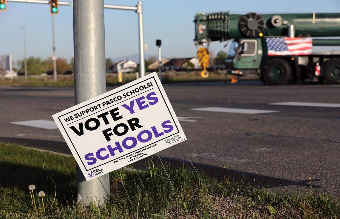 A support Pasco Schools sign for an upcoming levy vote is stuck in the ground on East A Street near the intersection with Heritage Boulevard in Pasco. 
