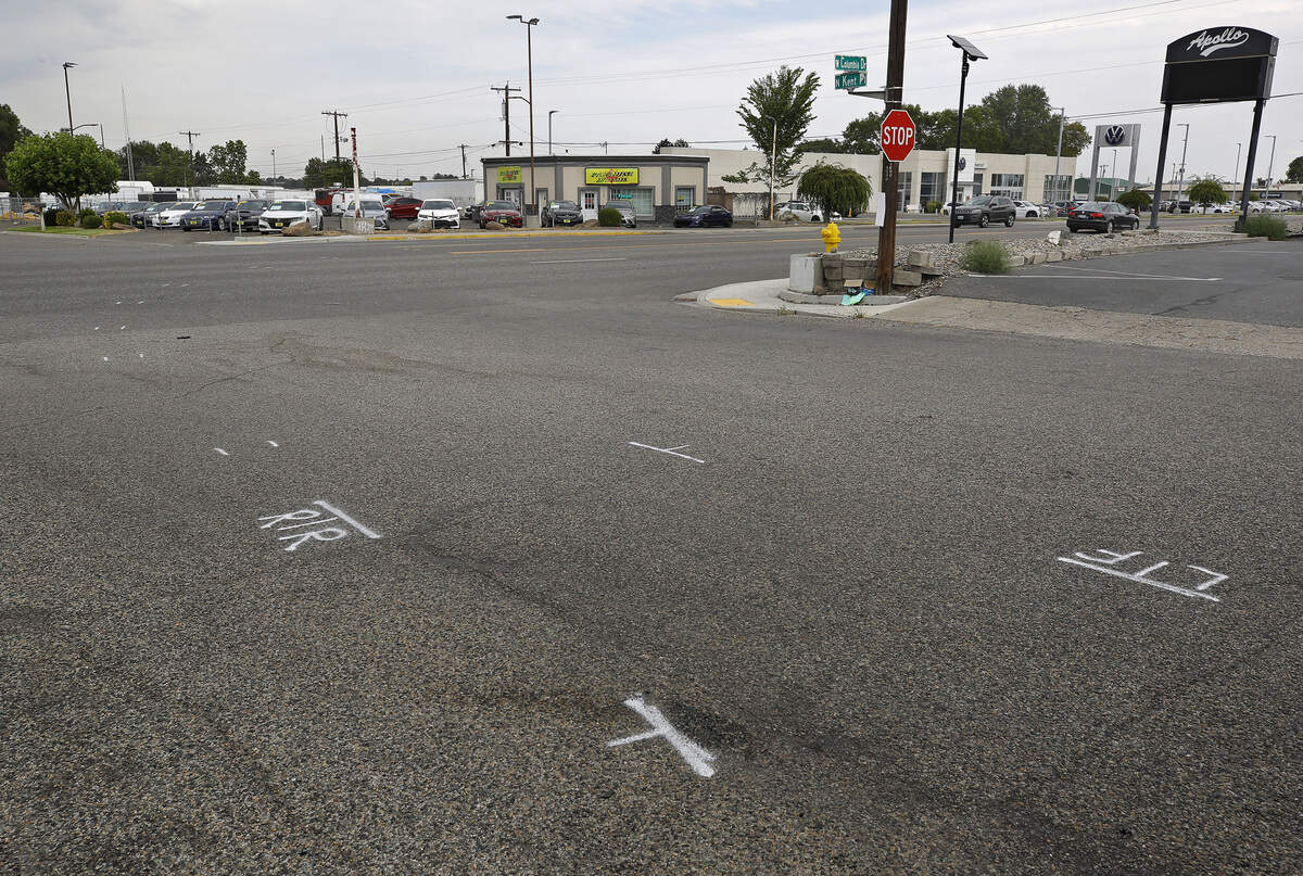 Police investigative paint marks indicate the Nissan Pathfinder driven by Valeria R. Benitez-Hernandez stopped on North Kent Place about 600 feet from where motorcyclist Donald “Garth” Rettinghouse, 69, was struck on West Columbia Drive at North Jean Street Sunday night in Kennewick.