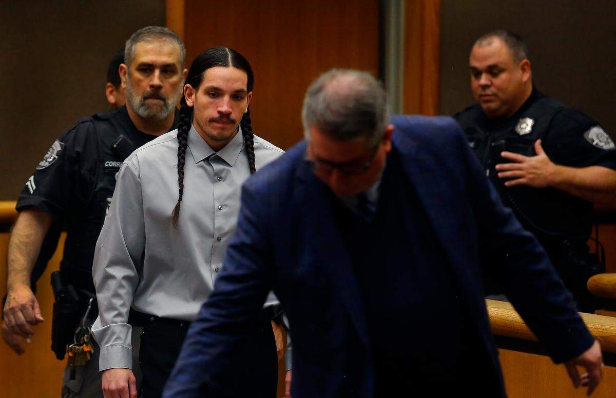 Convicted murderer Robert Suarez is escorted into Benton County Superior Court Tuesday morning.