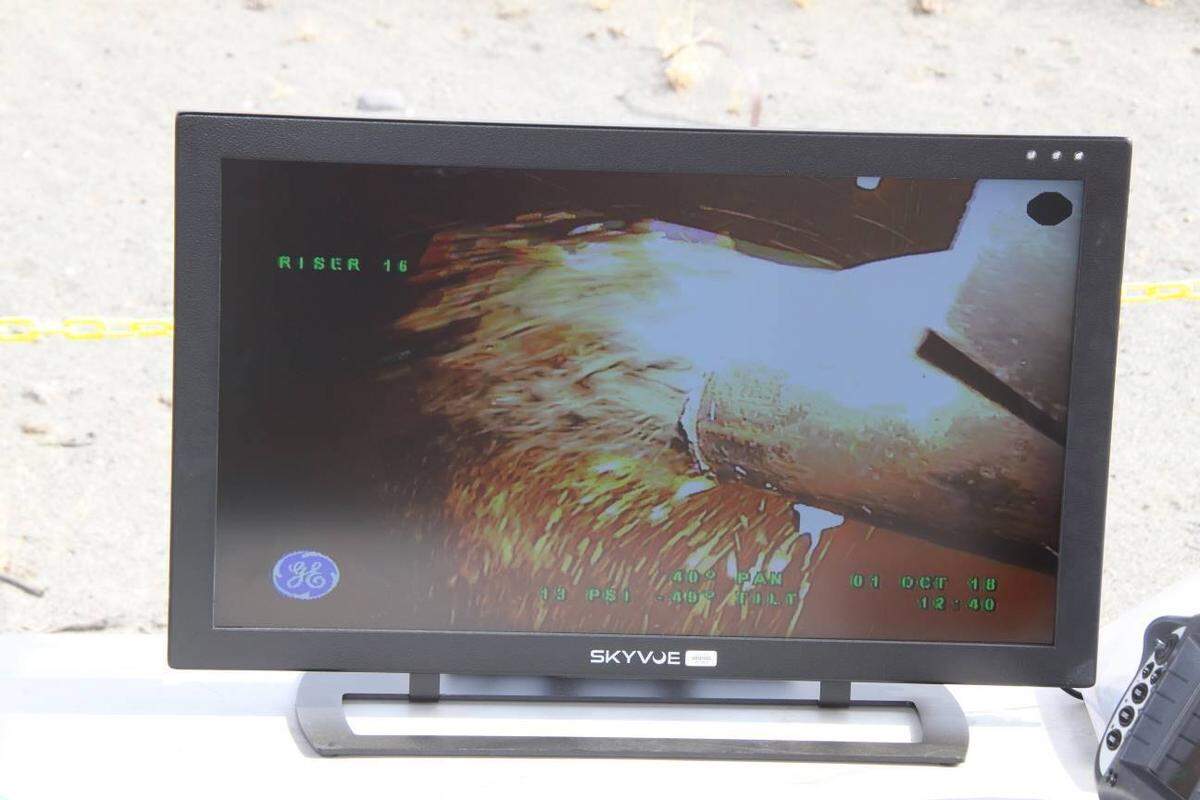 A monitor shows grout being added to a Hanford tunnel used to store radioactive waste.