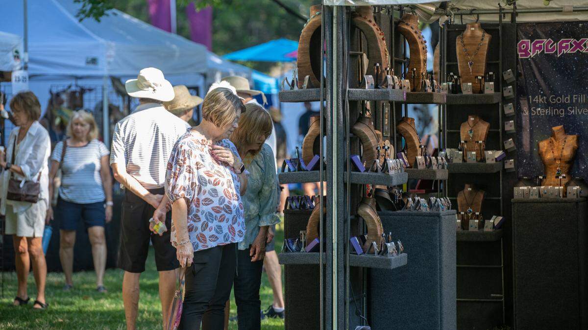 Hundreds of visitors braved the heat wave to flock to Howard Amon Park in Richland on Friday to shop at the artisan booths of the 71st annual Art in the Park. The free event continues 9 a.m. to 7 p.m. Saturday, July 30, and features over 250 vendors, food trucks and live music.