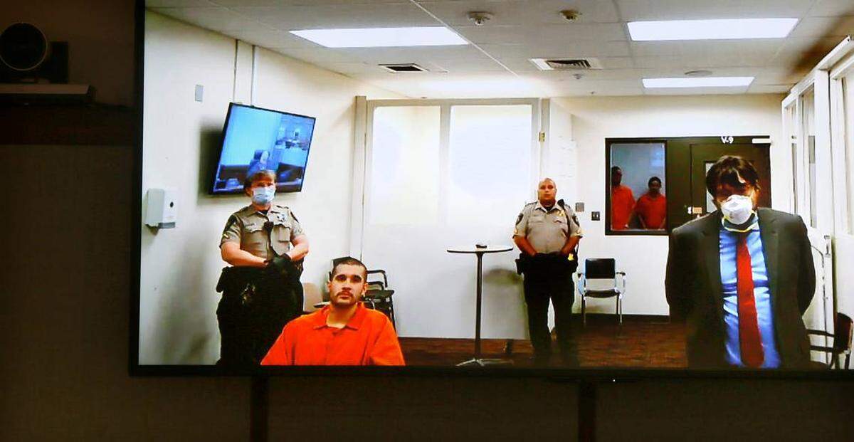 Pasco murder suspect Miguel Angel “Terco” Montalvo makes his preliminary appearance in Franklin Superior Court via video link with his provisional attorney Thursday afternoon in Pasco. Montalvo was injured and his cousin Juan Montalvo, also a murder suspect, was killed when they allegedly started shooting at police officers attempting to arrest them.