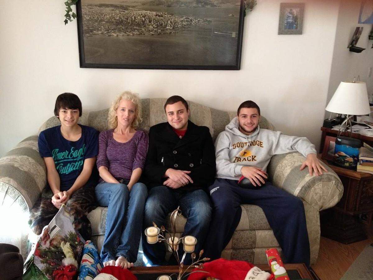 Zade Hakki, far right, with his brother Farris, left, mother, Betty, and brother, Abe, center.
