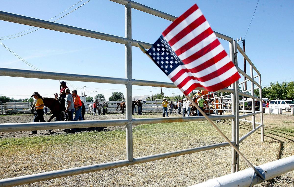 Participants and horses fill the arena during an event at the Richland Riders Club off Van Giesen Street in Richland. Katrine L. Smith, the club’s former treasurer, is was sentenced to prison for first-degree theft.