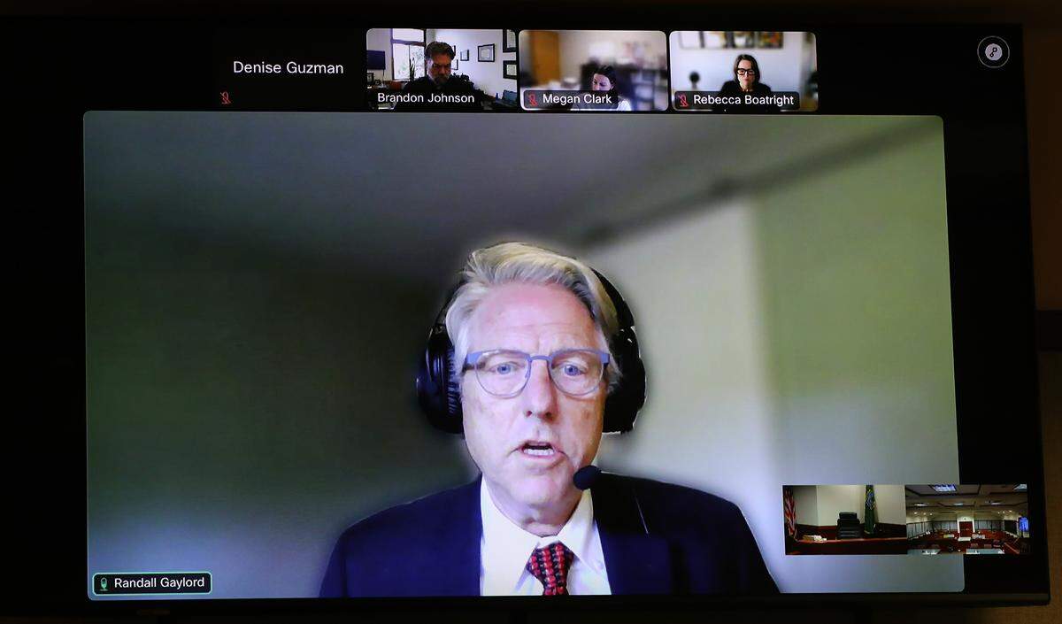 Attorney Randall Gaylord, representing Sheriff Jim Raymond, presents points to Judge Brandon Johnson against finding his client in contempt during Thursday's court hearing held via a video link.