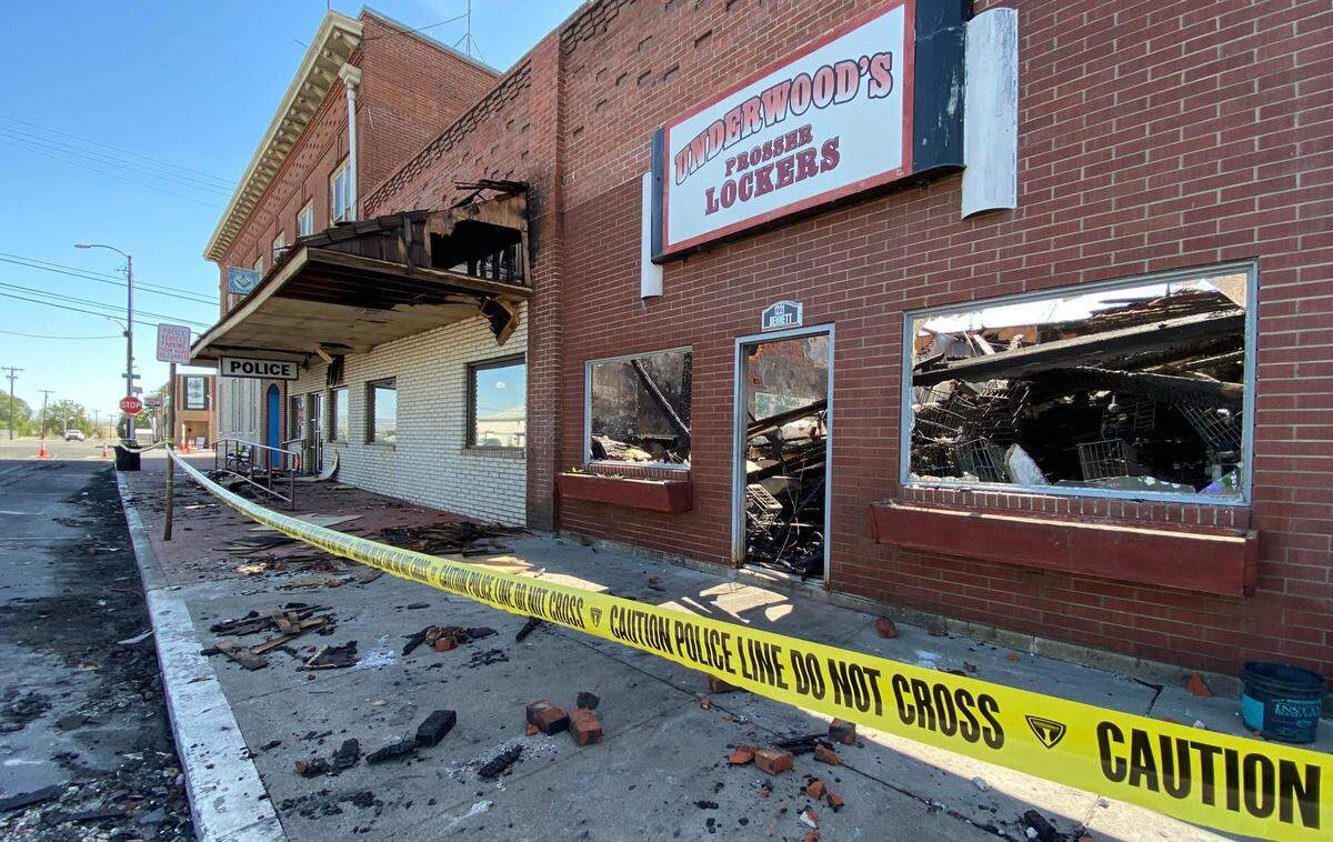 A three-alarm fire destroyed a longtime Prosser butcher shop and meat locker and damaged city hall and the police department on Saturday.