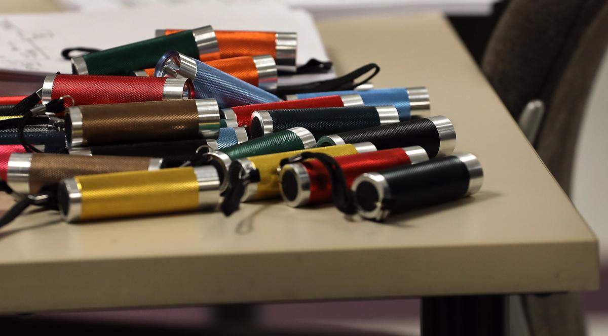 A pile of flashlights sits on a table for volunteers to use during the annual Point in Time homeless count in the Tri-Cities. The count starts before sunrise.
