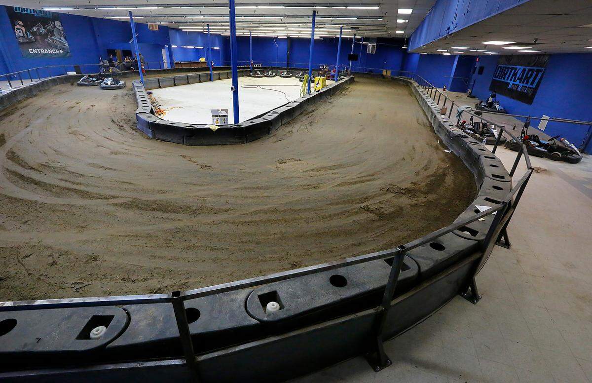 A metal fence and plastic barriers create the indoor dirt go-kart race track called DirtKart at 2203 West Fourth Ave. in Kennewick. The new business is preparing to open in time for Water Follies and other summer events held in the Tri-Cities.