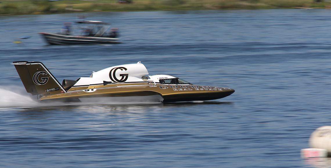 Andrew Tate in the U-91 Goodman Real Estate unlimited hydroplane crosses the finish line as the top qualifier on the Columbia River for the 60th running of the APBA Apollo Gold Cup.