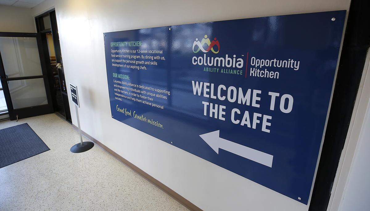 A sign guides customers to the Opportunity Kitchen in the downstairs restaurant space at the Federal Building in Richland. The 12-week training program is operated by Columbia Ability Alliance.