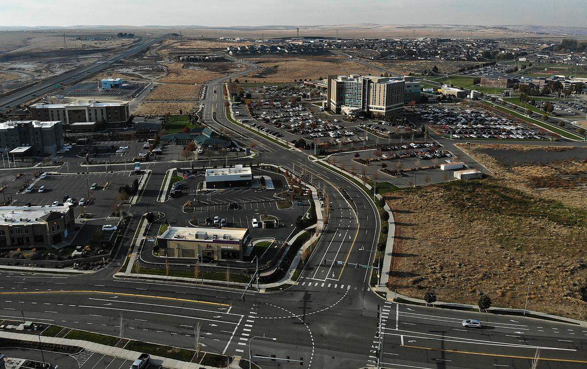 The intersection of Plaza Way and West Hildebrand Boulevard in Kennewick shows Trios Hospital complex, Southridge High School and commercial development in Kennewick.