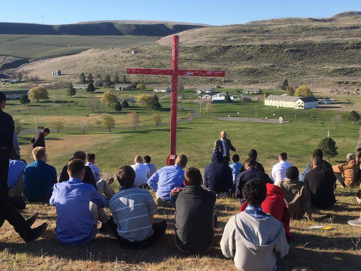 A photo from Master’s Ranch West’s now closed Facebook page shows a church service in 2020 above the Christian boarding school in Prescott. A permanent injunction that was issued in December against Master’s Ranch West in Walla Walla Superior Court prevents it from reopening without a license.