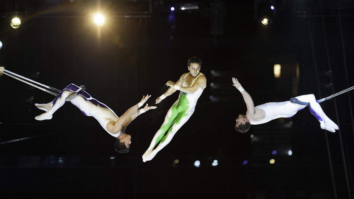 Trapeze artist perform high above the crowd at the Ringling Bros. and Barnum & Bailey Circus.