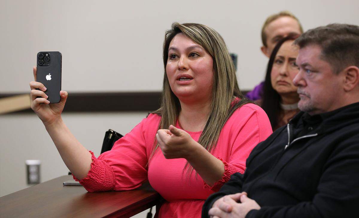 Franklin County resident Marcie Torres asks questions during Monday's news conference by Franklin County Sheriff Jim Raymond in Pasco.