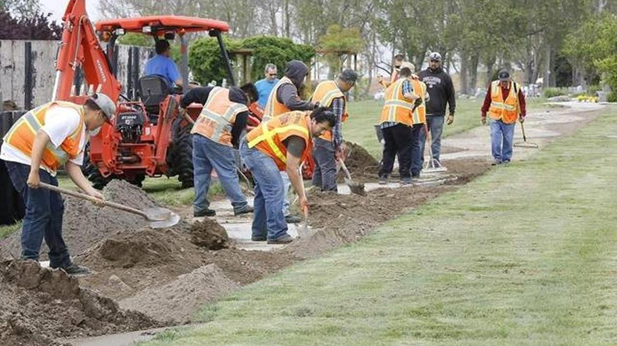 Ben Franklin Transit will detour buses around a parade to welcome the Vietnam Memorial traveling wall to Pasco starting at 2:30 p.m. today. Above, workers prepare City View Cemetery to host the 80 percent scale replica of the wall.
