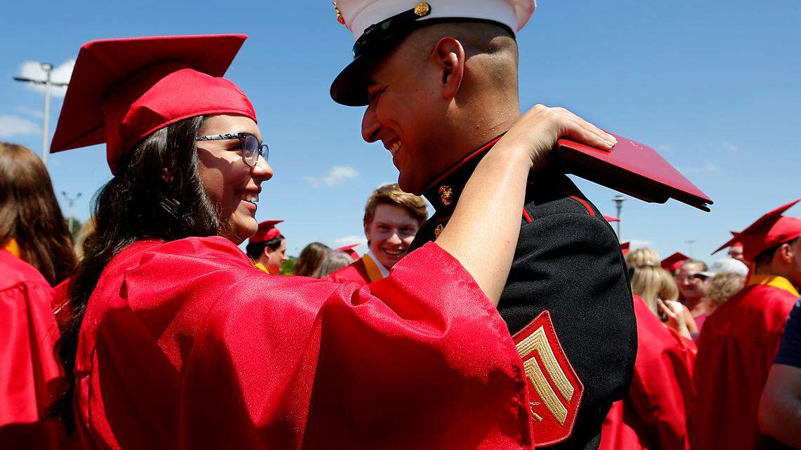 U.S. Marine makes surprise Tri-Cities visit after years away to see baby sister graduate