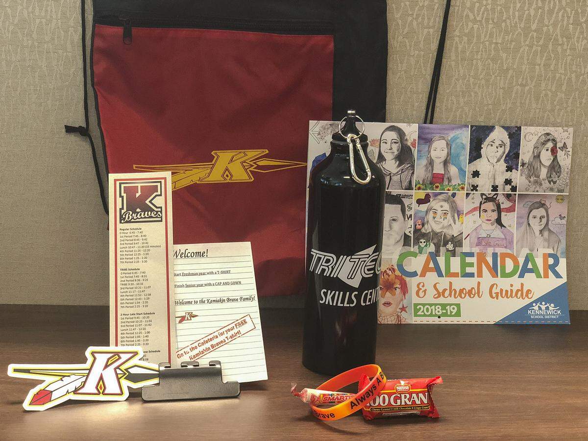 Kamiakin teachers travel to students’ home handing out goodie bags, welcoming the upcoming freshman class to high school.