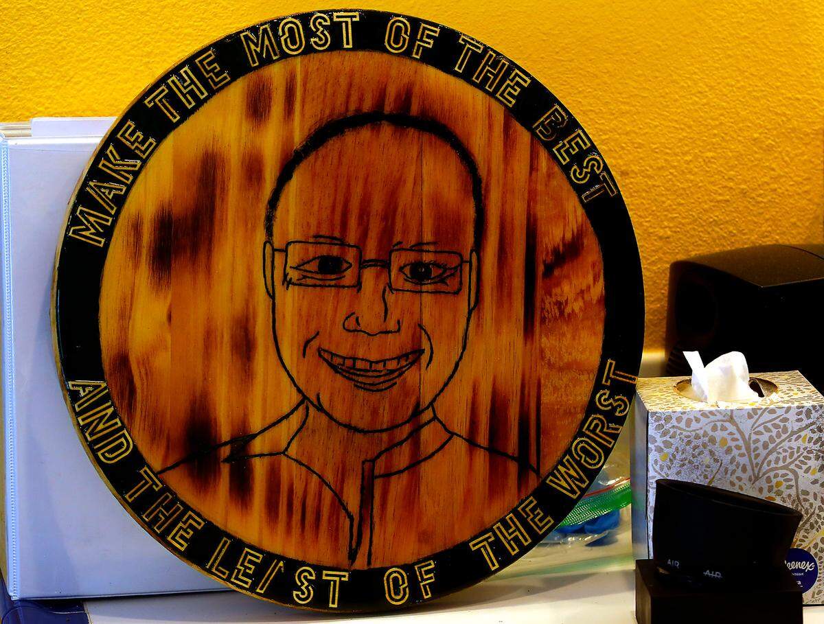 A woodworking project completed by youth in the Benton Franklin Juvenile Center spells out Eric Lipp’s motto for his approach to life. Lipp is being recognized for his contributions over a 26 year span at the Benton Franklin Juvenile Justice Center with a plaque naming the programs center room at the facility in his honor.