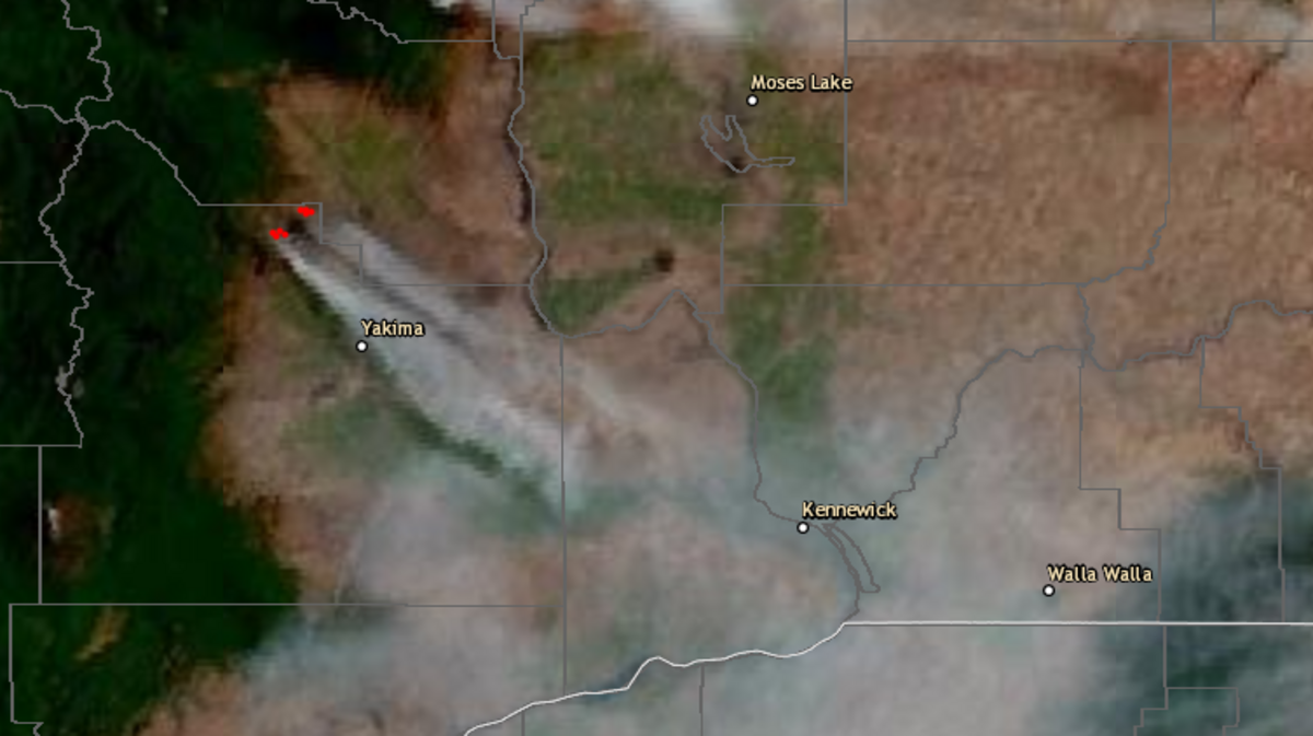 Satellite images show a line of smoke going from the Evans Canyon fire in Yakima County directly into the Tri-Cities.