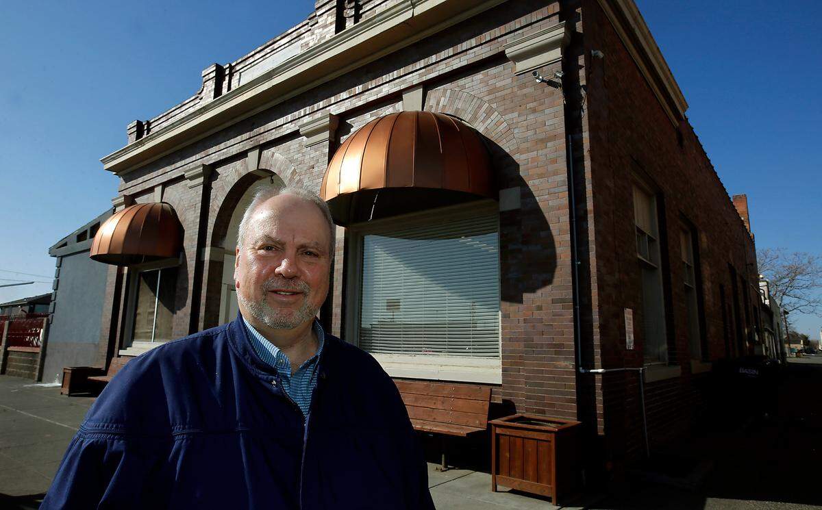 Andrew Porter, executive director at Tri-City Union Gospel Mission, stands outside the aging and cramped women’s shelter in Pasco that it’s working to replace.