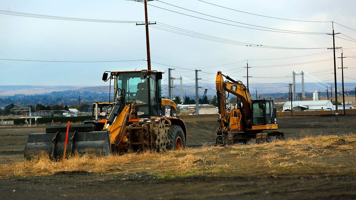 Heavy equipment sits idle at the site of the new Local Bounti greenhouse construction site on A Street near South Elm Avenue in Pasco.