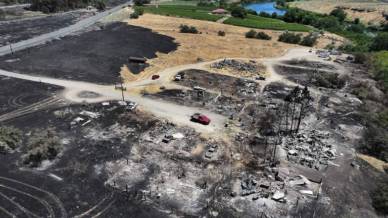 ‘Community hug.’ Benton City rallies after 5 homes destroyed in devastating wildfire