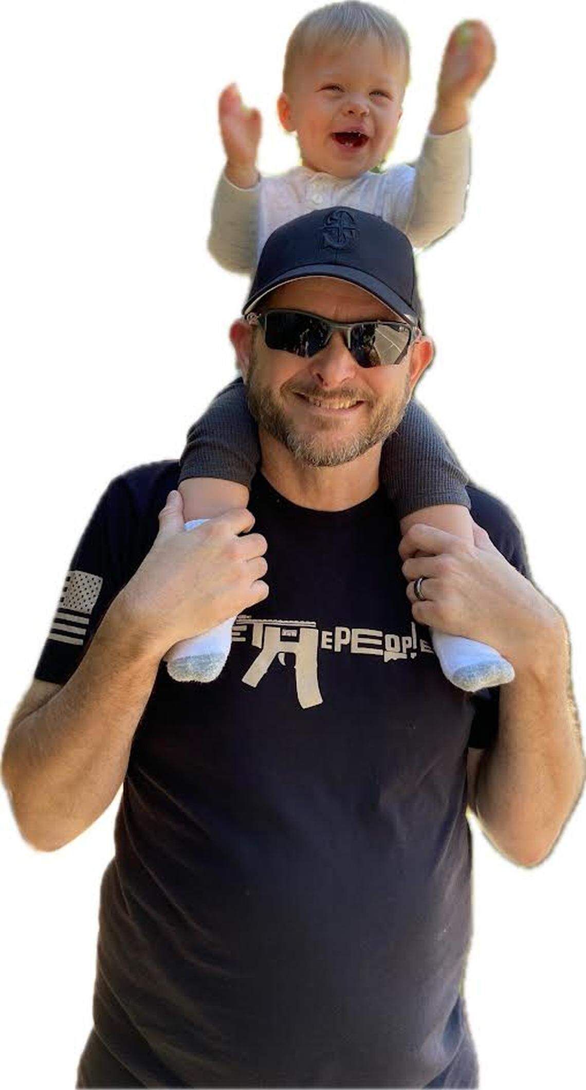 Todd Kleppin, a longtime youth mentorship leader in the Tri-Cities, is shown with a grandchild.