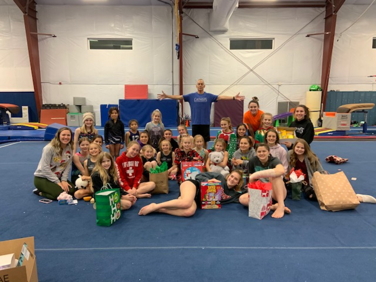 Emily Larson, front right, with fellow gymnasts at Garland’s Gymnastics in Kennewick.