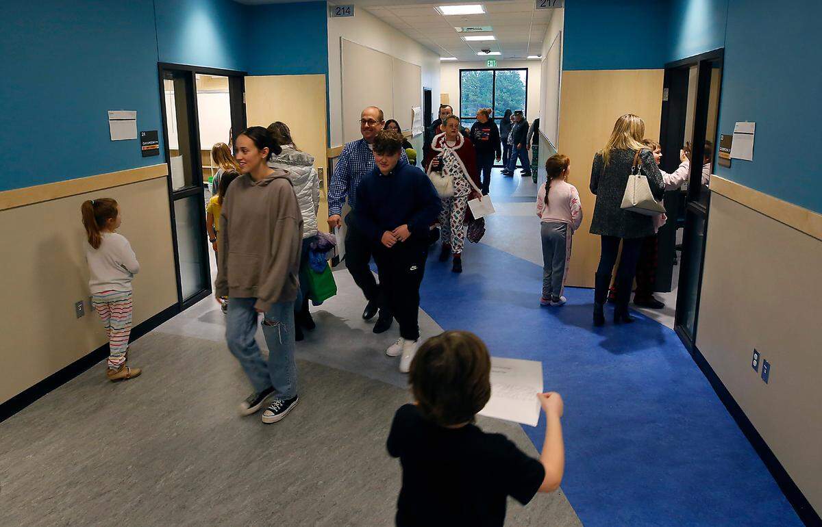 Students and family members take part in a special look inside the rebuilt Ridge View Elementary School.