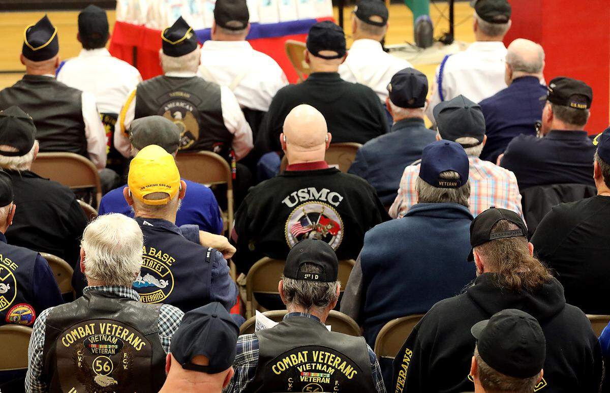 About 80 military Veterans are seated in the Highlands Middle School gymnasium for the Kennewick school’s Military Appreication Day ceremony. The National Junior Honor Society students, led by advisor Connie Fow, organized the celebration to honor those who have served the country. It was daylong event that included an assembly, luncheon and classroom visits by the Veterans. The keynotw speaker at the assembly was retired submariner Capt. Ted Miller of Richland.