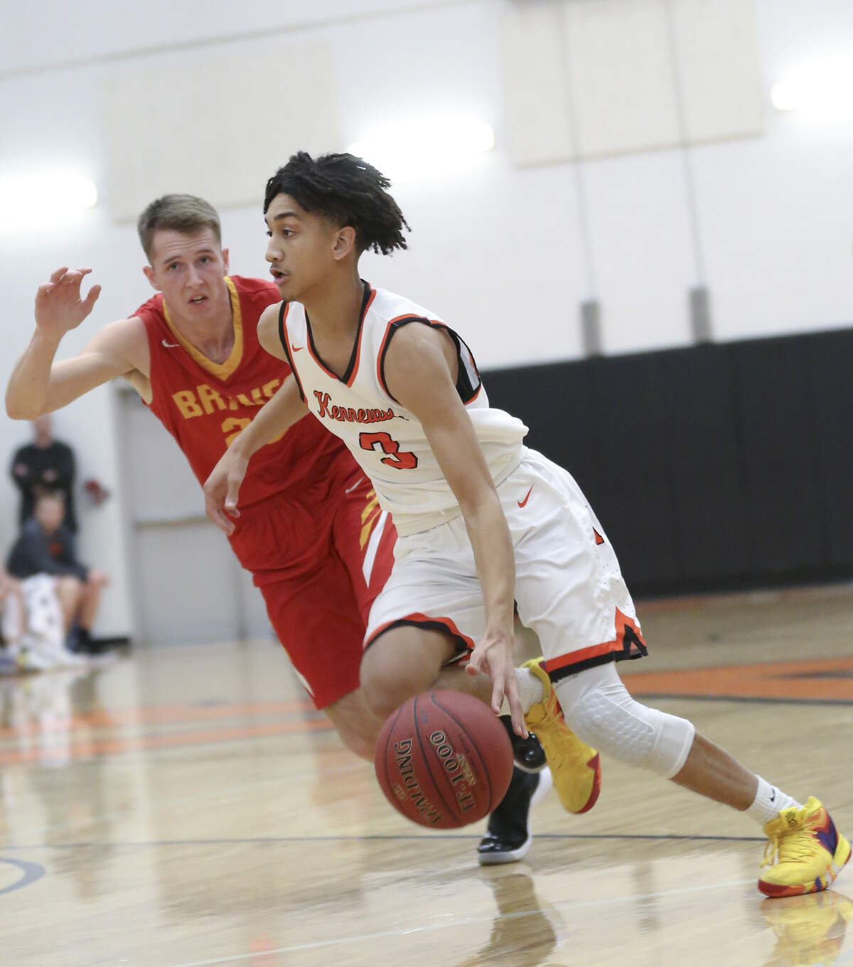 Kennewick’s Ayoni Benavidez (3) dribbles the ball during a game against Kamiakin at Kennewick on Friday. Kamiakin won 80-49.