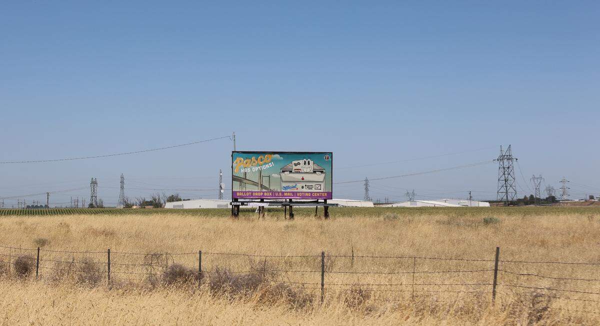A billboard on Highway 12 in Pasco encourages voting.