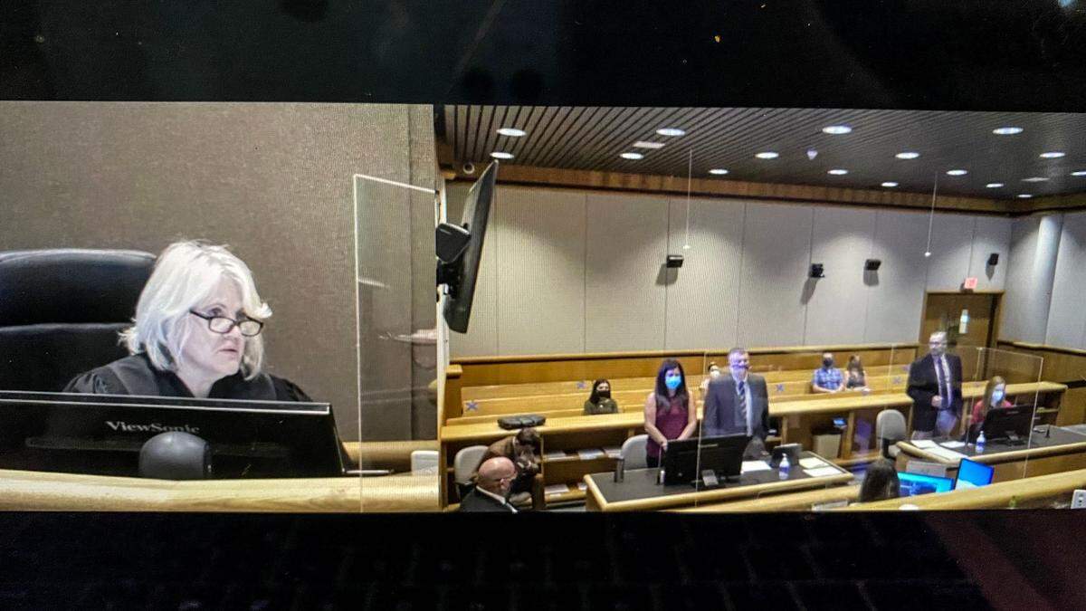 Judge Jackie Shea Brown, left, presides over Tuesday’s Benton County Superior Court hearing for Jocelyn M. Bellon. The former nanny, who stands behind the defense table with attorney Scott Johnson, entered an Alford plea to second-degree manslaughter for the 2016 death of 2-year-old David Schreiber.