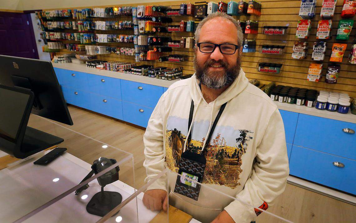 Steve Lee, co-owner of Green2Go, stands in their newest storefront on Road 90 in west Pasco.