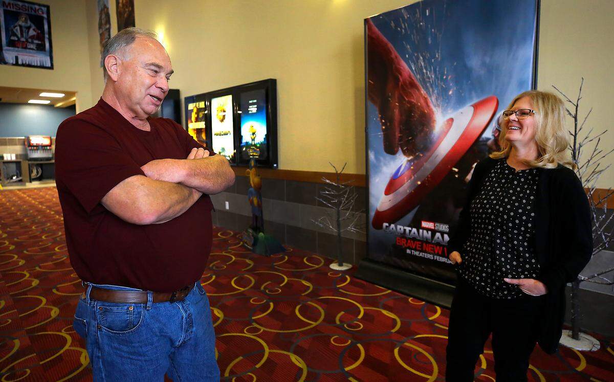 Jeff Fairchild, left, and general manager Mamie Gale talk about a remodeling project scheduled for 2025 of the Pasco Farichild Cinemas while standing in the theatre’s lobby.