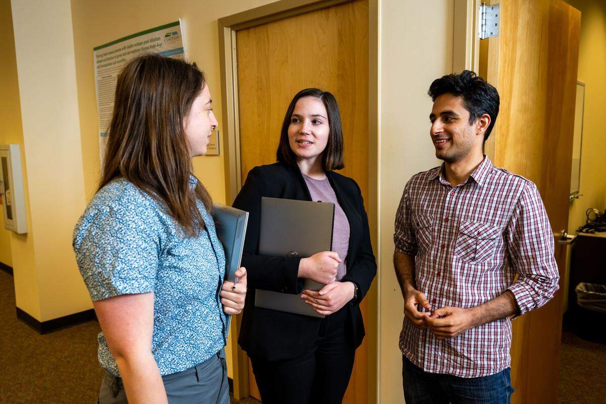Researchers Taryn Waite, Leeya Pressburger, and Hassan Niazi, from left, and their colleagues at the Joint Global Change Research Institute advance fundamental understanding of human and Earth systems. Niazi recently led a study to explore how groundwater extraction will evolve over the 21st century.