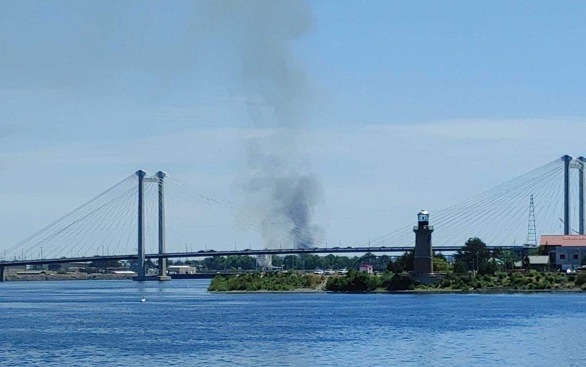 Smoke from a fire at Tri-City Pallets in Pasco can be seen from Kennewick.