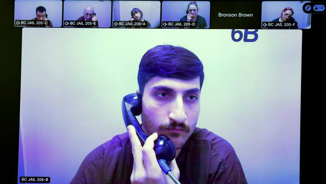 Murder suspect Abdullah A. Hussein appears via a video link in Benton County Superior Court in February 2026. He is charged with the fatal stabbing of his girlfriend’s ex-partner in a store parking lot.