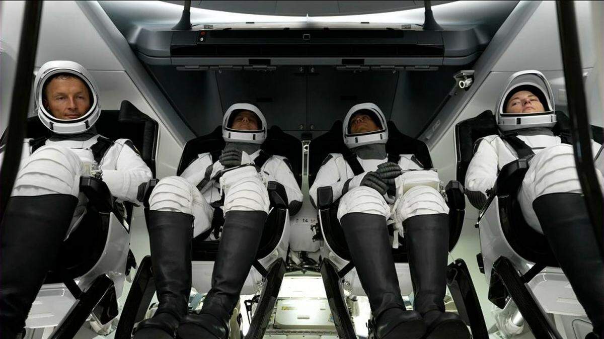 NASA’s SpaceX Crew-3 astronauts are seen inside the Crew Dragon spacecraft before their seats were rotated into a launch position on Tuesday. Astronaut Kayla Barron, of Richland, is on the right.