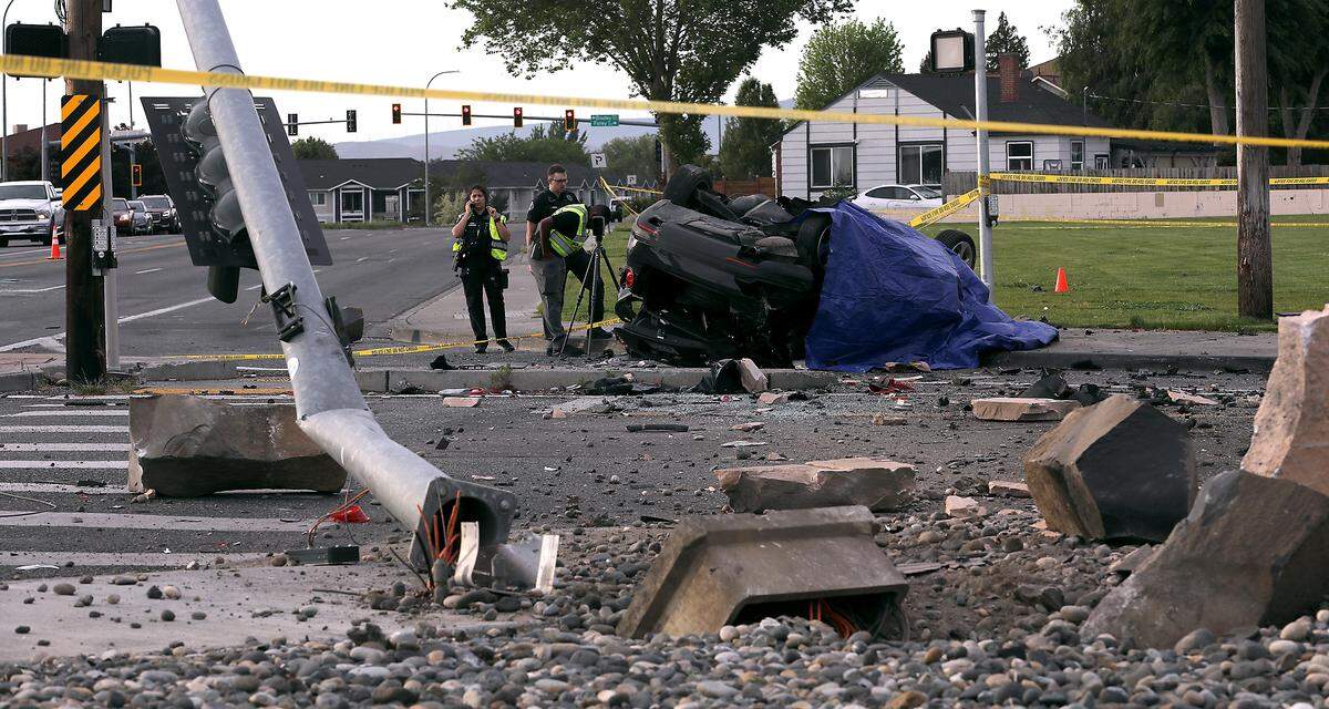 Richland police investigate a fatal crash on George Washington Way at Jadwin Avenue.