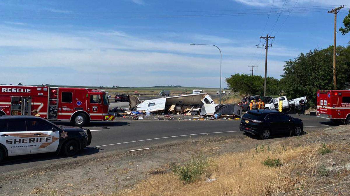 Two people died in this two truck collision Tuesday on Highway 395 just north of Pasco.