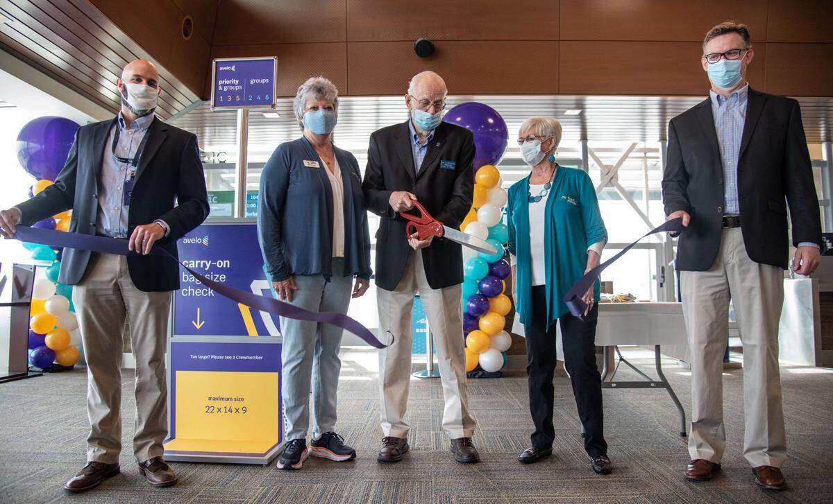 Port of Pasco Commissioner Jim Klindworth, center, is flanked from left to right by Buck Taft, airport manager, and Commissioners Vicki Gordon Jean Ryckman, and TRIDEC President and CEO Karl Dye.
