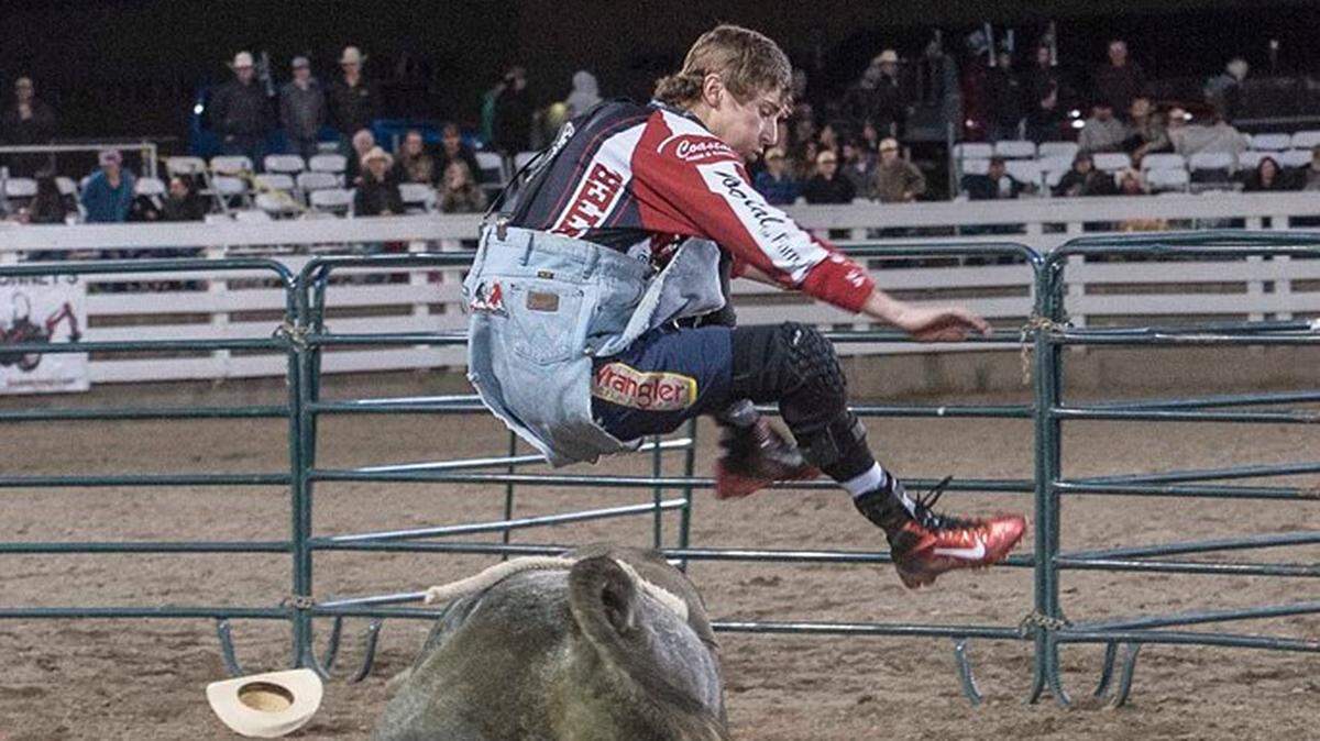Miles Barry of Kennewick leaps over a bull named Murder Ink during a bullfighting event in Hermiston last spring. Barry, a junior at River View High School, will compete in the Bullfighters Only event Saturday at Toyota Center.